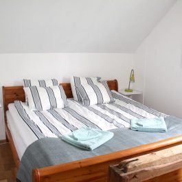 Ferienhaus Arkösund Gård Schlafzimmer mit Doppelbett